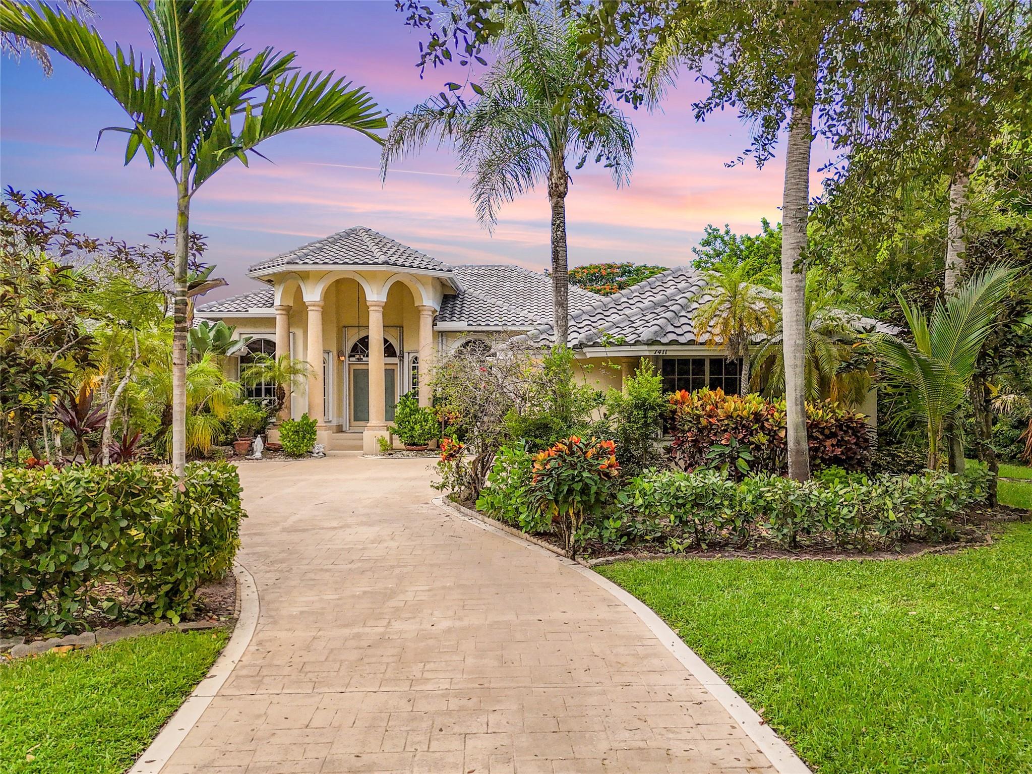 Incredible Opportunity to own this one-of-a-kind home. Tucked behind the guarded gate entrance of Cypress Head this estate waits for you. Old World Travertine Tiles Throughout the main flow of the house. Beautiful wood like tile in all the bedrooms. 14 ft ceilings with gorgeous crown molding. 2 magnificent chandeliers imported from Italy. Designer custom shades on all the windows. Beautiful kitchen with huge Island. Accordion Hurricane Shutters on all the windows and hurricane garage doors. All new 2024 Roof, 2023 water heater. 3 brand new ac and an additional mini split in master bedroom to keep you extra cool. Amazing open pool area with a screened in patio to the side. Full grown Mango trees in the beautiful and large back yard. NO SHOWINGS TILL OPEN