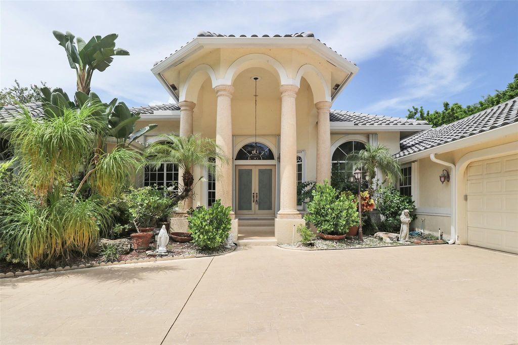 Photo of 7411 N Cypresshead Drive, Parkland, FL 33067 (MLS # F10521452)