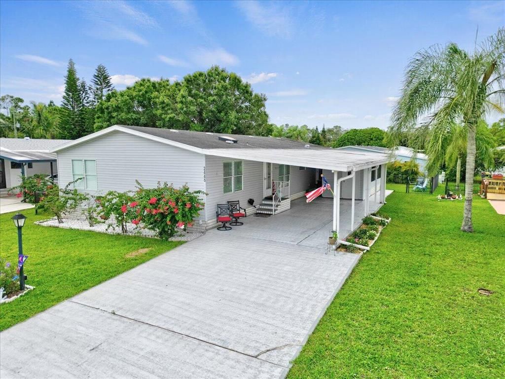 Photo of 2446 SW Versailles Ter, Stuart, FL 34997 (MLS # R10885658)