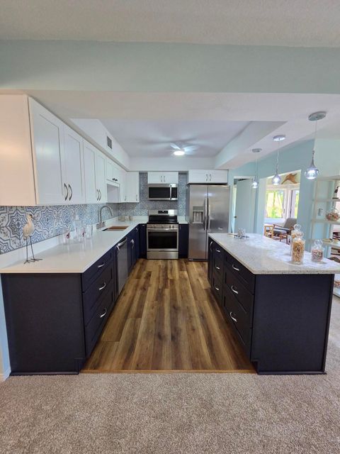 Photo of 1800 SE Saint Lucie Boulevard #7-301, Stuart, FL 34996 (MLS # B26054735)