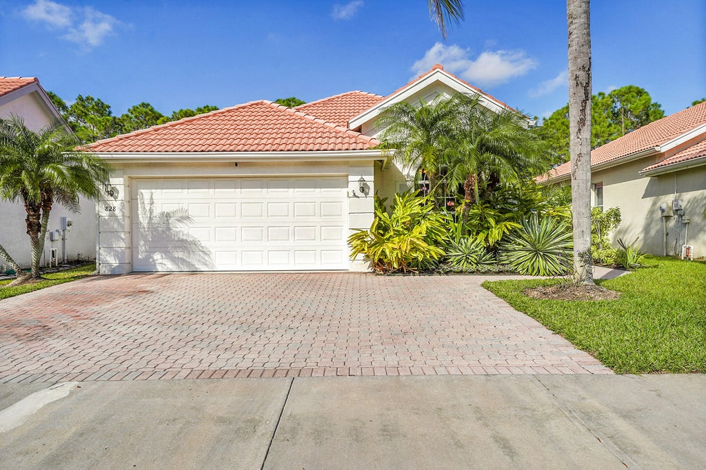 Photo of 828 SW Munjack Circle, Port Saint Lucie, FL 34986 (MLS # R11058326)