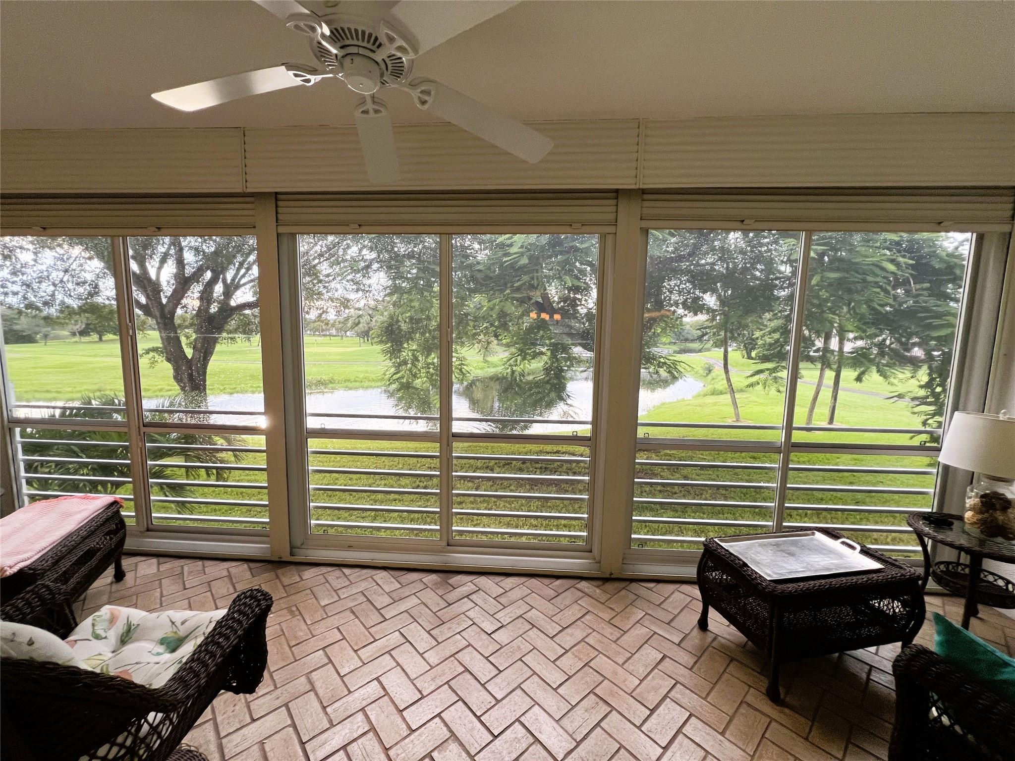SPECTACULAR EXPANSIVE WATER/GOLF VIEW from this 2nd FLOOR *TURN-KEY FURNISHED Unit with MODERN REMODELED OPEN KITCHEN Including STAINLESS STEEL APPLIANCES, Easy Close WOOD CABINETS, CORIAN COUNTERS with TILE Backsplash and HIGH-HAT LIGHTING Plus PLEXI-GLASS ENCLOSED PATIO with Roll-Up Shutters. REMODELED GUEST BATHROOM and TILE THRU-OUT Except Living Room and Main Bedroom. ASSOC REQUIRES ONE OCCUPANT 55+ 20% DOWN AND WYNMOOR INCOME FORMULA AND A CREDIT SCORE OF 700 + $250 REFUNDABLE MOVE-IN FEE. Information Deemed Reliable but, Not Guaranteed*ONE VEHICLE ONLY Second vehicles are not permitted under any circumstances. *Living Room Wall Decor, Dining Room White Frame Wall Decor, Hallway Ladies Wall Decor, Metal Frog and Bric-a-Brac at Seller Option.