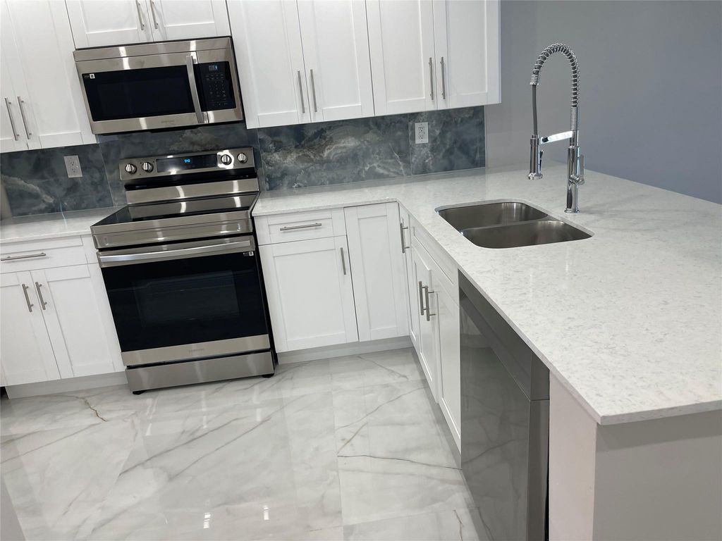 Photo of 6530 Coral Lake Drive #306, Margate, FL 33063 (MLS # B26022773)