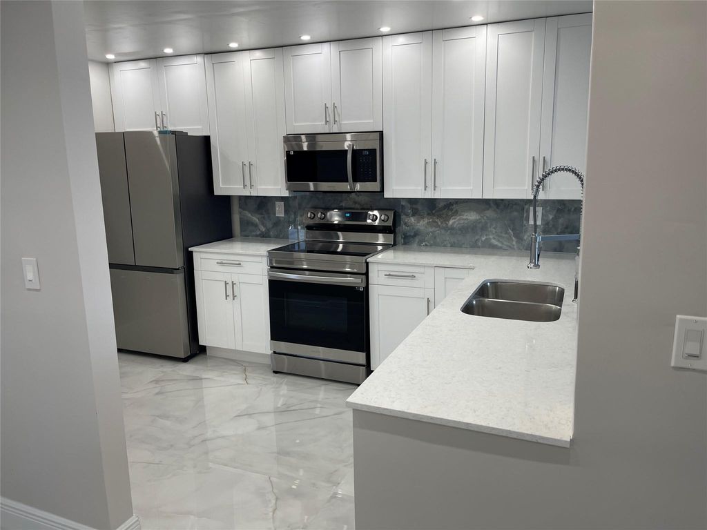 Photo of 6530 Coral Lake Drive #306, Margate, FL 33063 (MLS # B26022773)