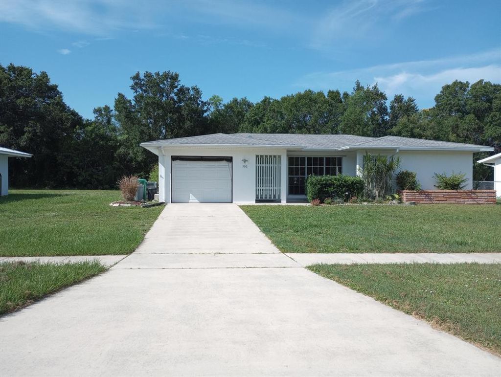 Photo of 300 NE Solida Drive, Port Saint Lucie, FL 34983 (MLS # R10818455)