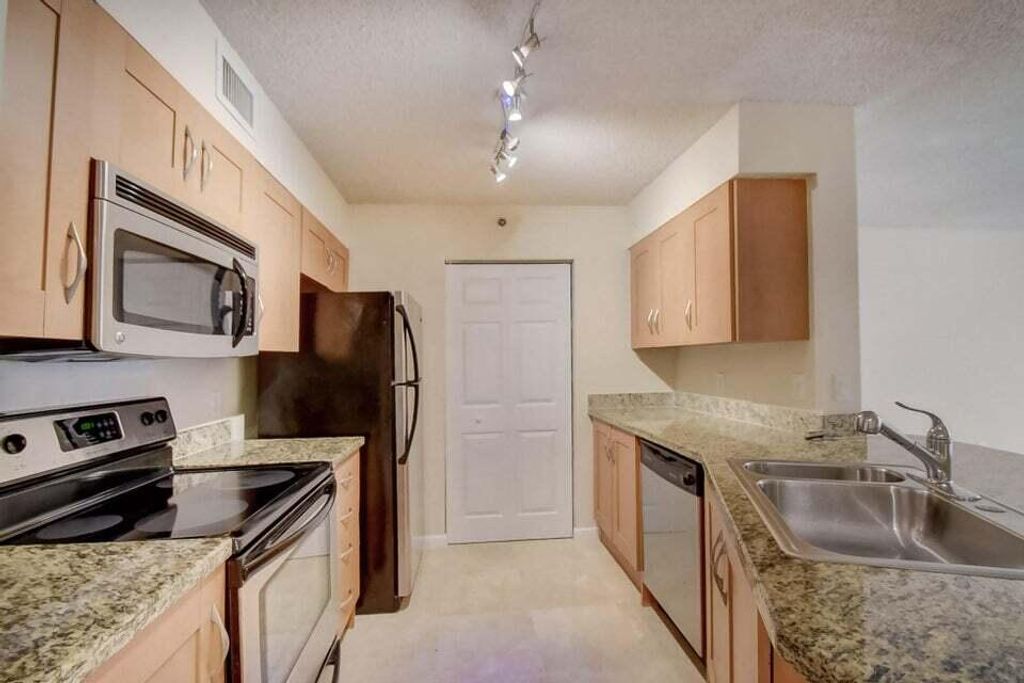 Photo of 3279 Clint Moore Road #203, Boca Raton, FL 33496 (MLS # R11041969)