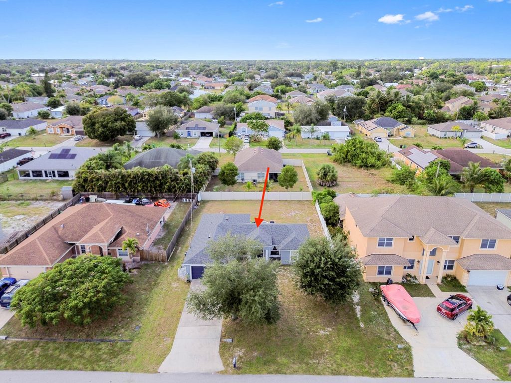 Photo of 3514 SW San Benito Street, Port Saint Lucie, FL 34953 (MLS # R11145451)