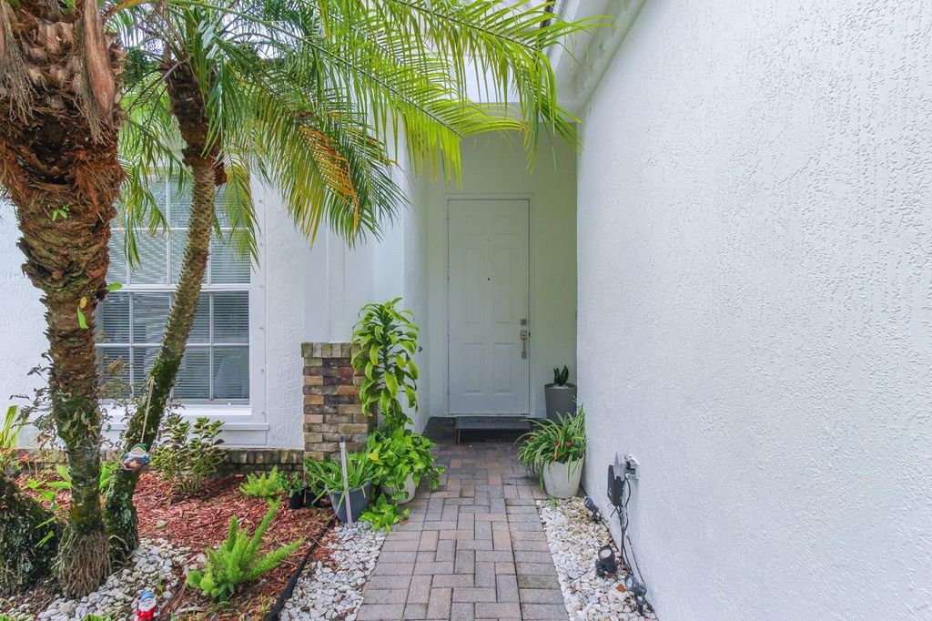 Photo of 10110 SW Chadwick Drive, Port Saint Lucie, FL 34987 (MLS # F10515078)