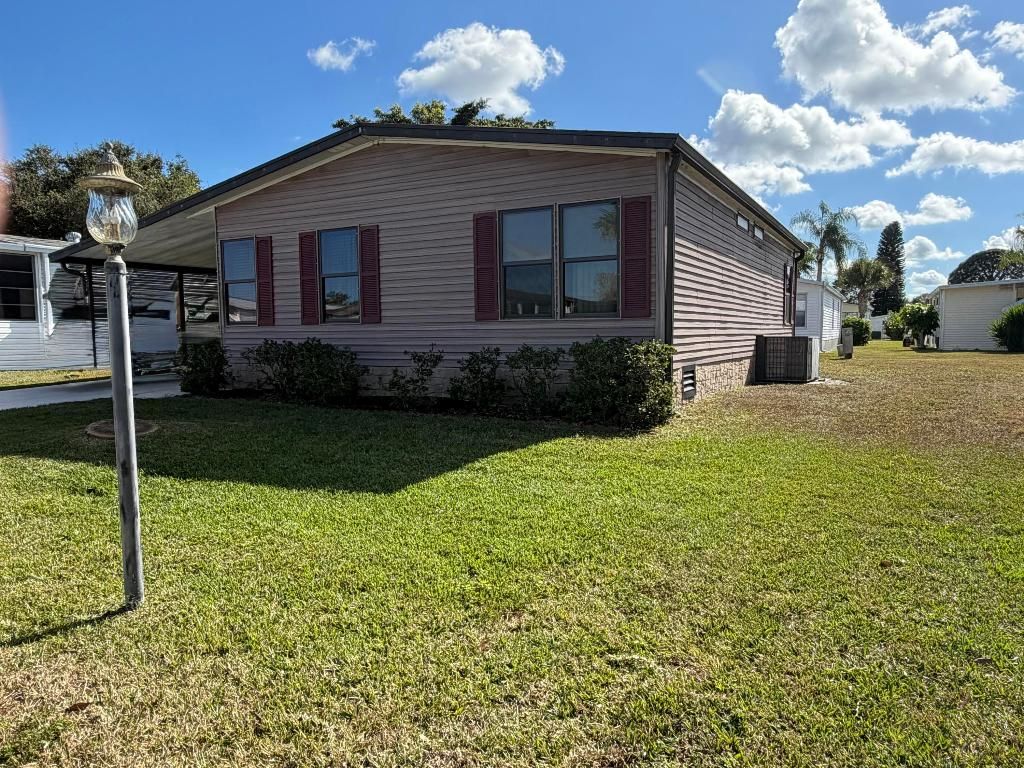 Photo of 13975 Clavell Avenue, Fort Pierce, FL 34951 (MLS # R11153619)