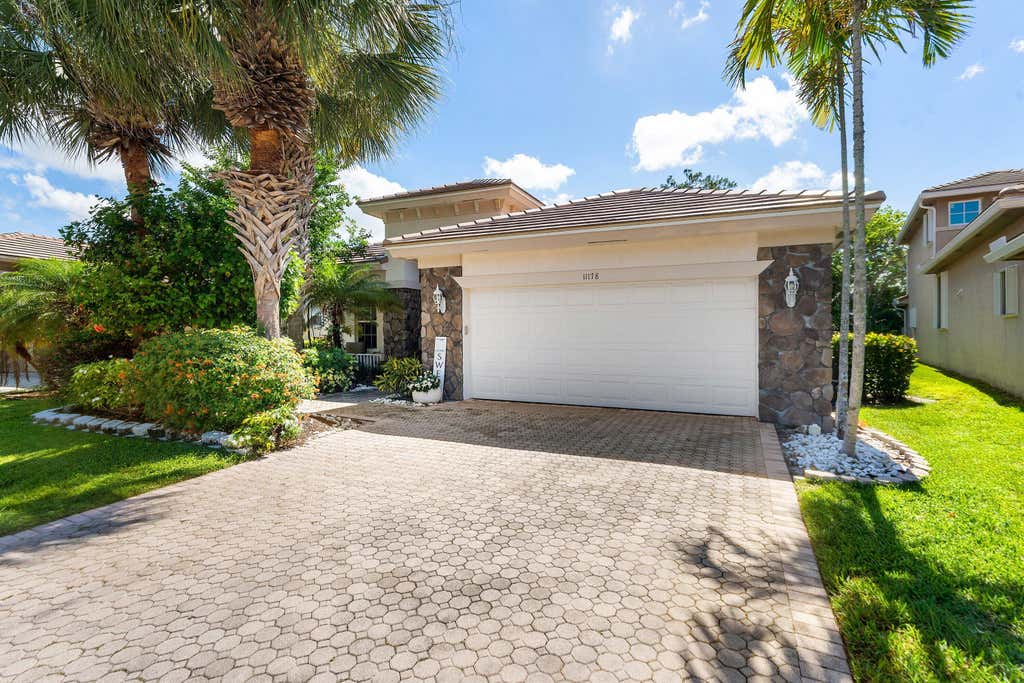 Photo of 11178 Osprey Lake Lane, Palm Beach Gardens, FL 33412 (MLS # B26020617)