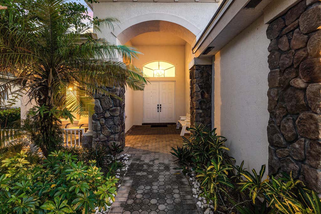 Photo of 11178 Osprey Lake Lane, Palm Beach Gardens, FL 33412 (MLS # B26020617)