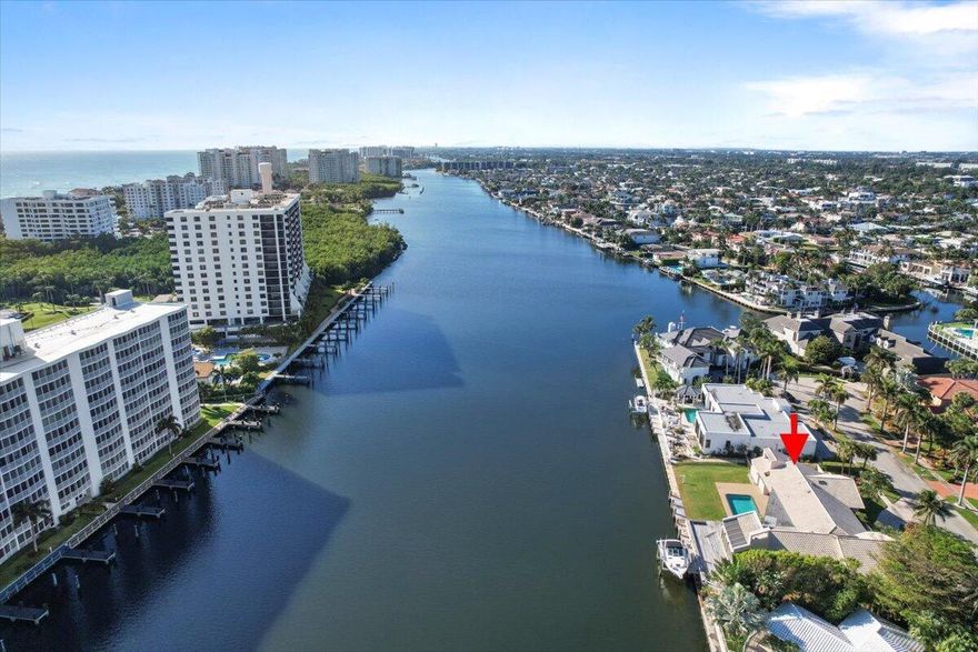 Create your dream home on this expansive, direct Intracoastal lot, boasting breathtaking panoramic views and 135 feet of water frontage. With no fixed bridges and quick ocean access, it's an ideal location for fishing and boating enthusiasts. Situated in the desirable Boca Bay Colony neighborhood, this lot-and-a-half property offers an exceptional waterfront development opportunity. Enjoy nearby fine dining and upscale shopping in both downtown Boca Raton and Delray Beach's vibrant Atlantic Avenue.