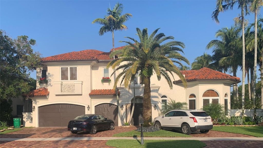 Photo of 641 Coconut Palm Terrace, Plantation, FL 33324 (MLS # F10425308)