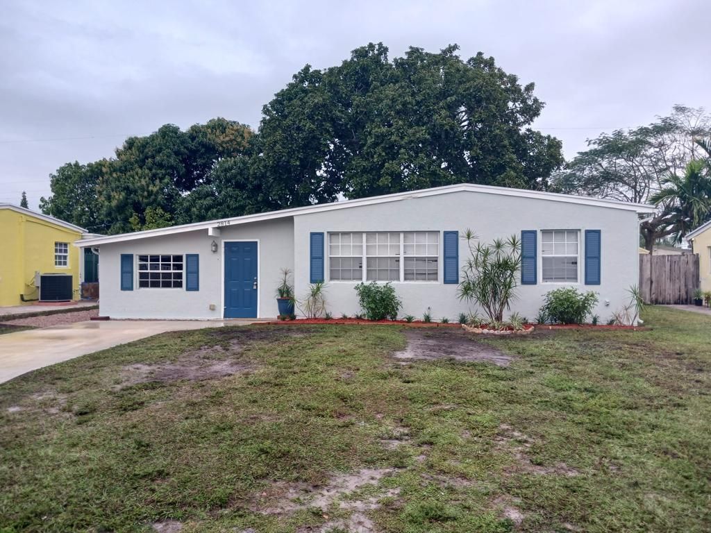Photo of 2814 Buckley Avenue, Lake Worth, FL 33461 (MLS # R10953837)