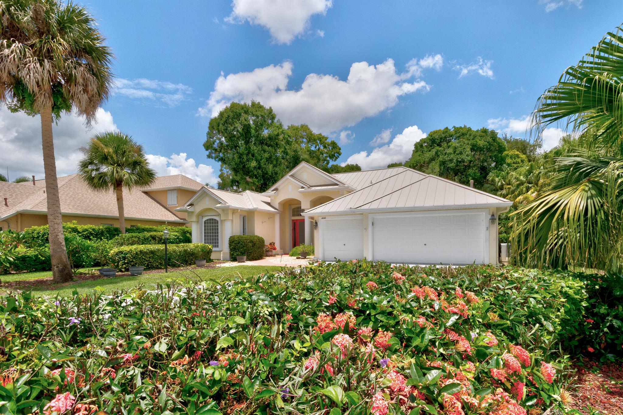 LOOK NO FURTHER! Here awaits the perfect Florida home w/ a tropical oasis pool & spa that will make you feel like you're in Shangri La! Where to start: 4BR; 3BA; 3CG; new interior paint & carpet; whole house natural gas generator; 2021 metal roof; Accordion shutters; gourmet kitchen w/ gas stovetop, island & pantry; triple split floorplan; huge primary suite w/ French doors to pool, 2 walk-in closets, double vanities, walk-around shower & soak tub; guest room w/ en-suite bath; pool bath; built-in desk/drop zone; Plantation shutters; alarm system; etched glass front door; and the list goes on!