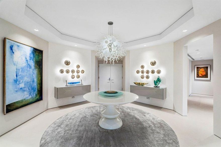 A luxuriously spectacular apartment in an exceptional building. 2000 Sloan's Curve is known to be one of the premier Associations in Palm Beach, and this is one of its finest apartments. With three distinct views enjoyed by its wrap-around terrace, including the Intracoastal, gardens, and ocean, it provides amenities- rich condominium living of the highest order. A short drive to the town center, Worth Avenue, and the Palm Beach Day school, this package includes beach, pool, six tennis courts, a fully staffed clubhouse, and a fitness center.Light fixtures do not convey unless ourchased furnished.