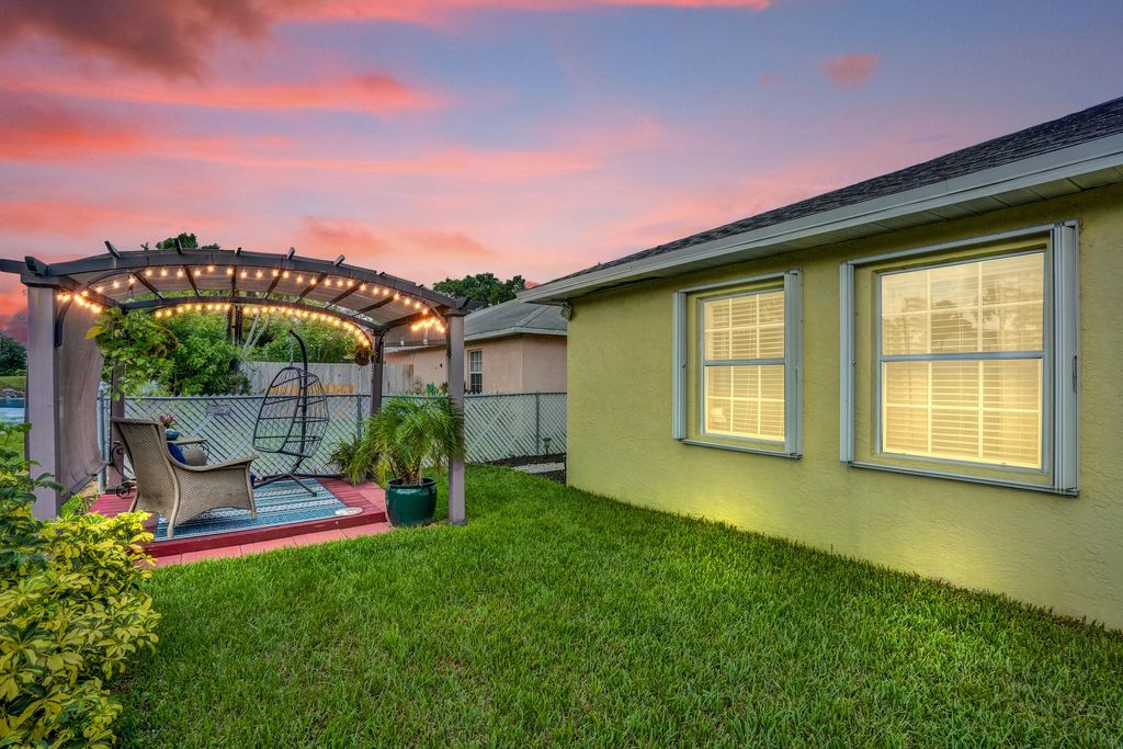 Photo of 153 Plumage Lane, West Palm Beach, FL 33415 (MLS # R10998155)