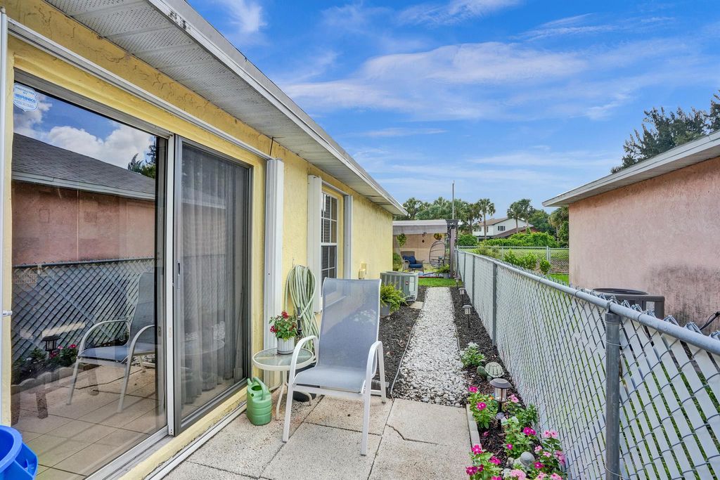 Photo of 153 Plumage Lane, West Palm Beach, FL 33415 (MLS # R10998155)