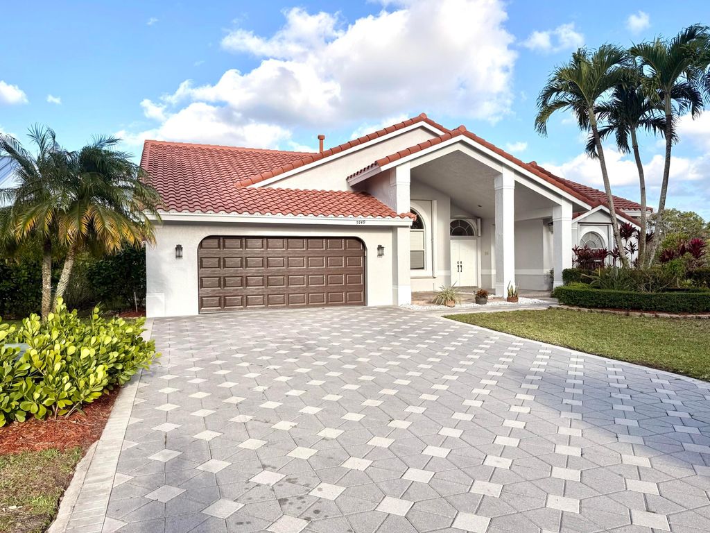 Photo of 5749 NW 101st Way, Coral Springs, FL 33076 (MLS # B26016556)