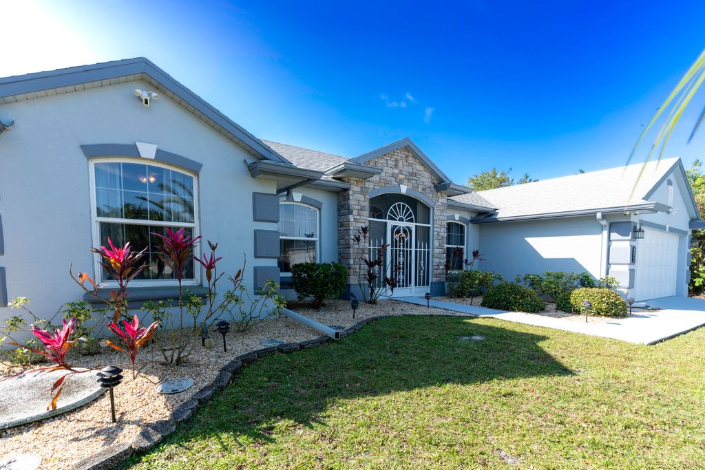 Photo of 1580 SW Santander Avenue, Port Saint Lucie, FL 34953 (MLS # R10959927)