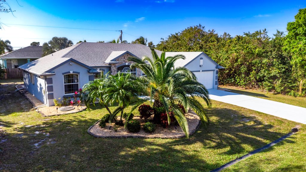 Photo of 1580 SW Santander Avenue, Port Saint Lucie, FL 34953 (MLS # R10959927)