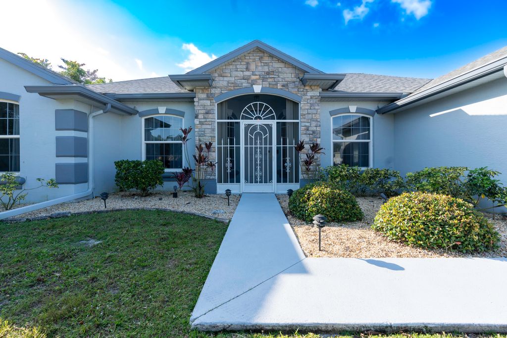 Photo of 1580 SW Santander Avenue, Port Saint Lucie, FL 34953 (MLS # R10959927)