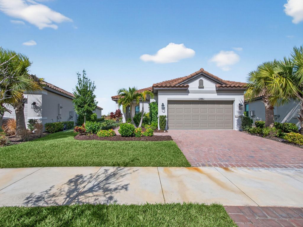 Photo of 12861 SW Ambra Street, Port Saint Lucie, FL 34987 (MLS # R11140492)