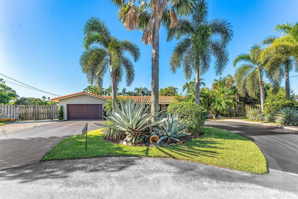Photo of 2074 NW 38th Street, Oakland Park, FL 33309 (MLS # R11137555)