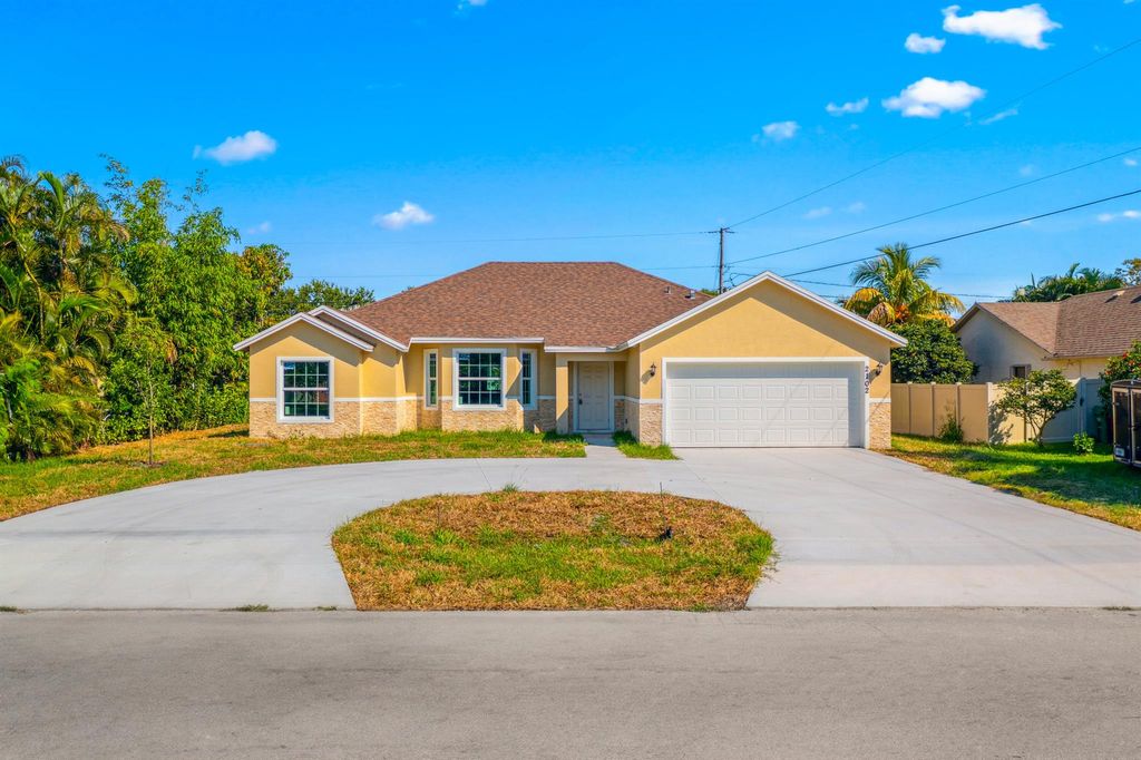 Photo of 2102 SE North Blackwell Drive, Port Saint Lucie, FL 34952 (MLS # R10992829)