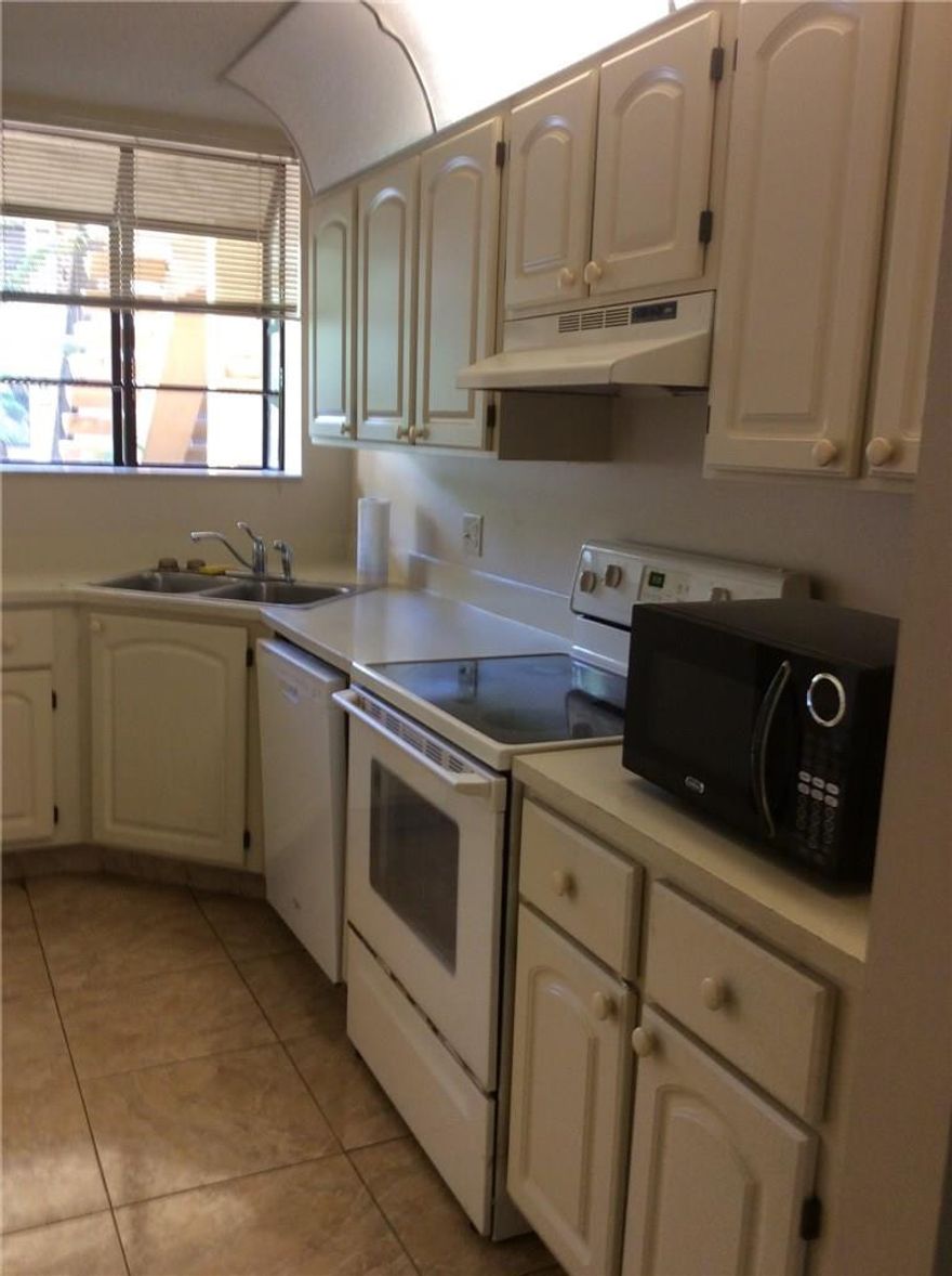 2 Bed/2 Baths in sought after gated community at Excellent Location! Nice screened in patio with garden view.Water/Sewer/ Trash included in rent. Small pet ok. Short walk to shopping and dining.