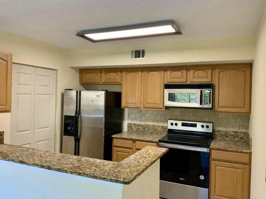 Photo of 291 SW Palm Drive #205, Port Saint Lucie, FL 34986 (MLS # R10972149)