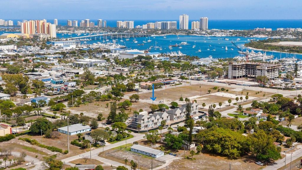 Photo of 132 W 11th Street, Riviera Beach, FL 33404 (MLS # B26035355)