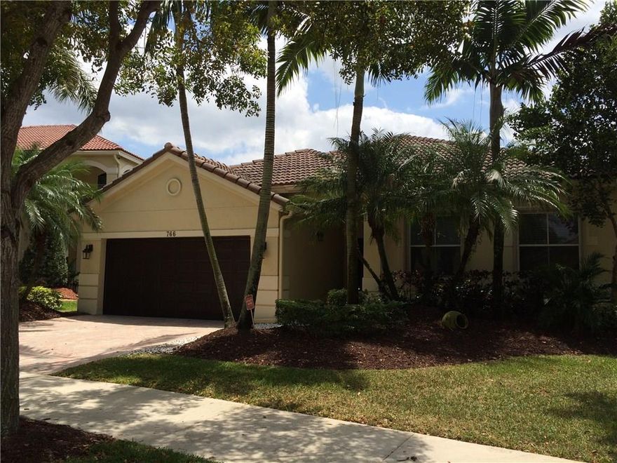 Welcome home!  This beautifully maintained home boasts a great outdoor space w/long lake water views, solar heated pool w/LED lighting, brick pavers, Bose outdoor speakers & Fenced yard. Interior features an open floor plan w/a huge family room that overlooks the water with 2 sets of sliding doors.  Freshly painted inside and out, 2 A/C units replaced in 2014, Stainless appliances, large breakfast bar, front loading newer washer/dryer, and 2 Nest thermostats for energy efficiency. Accordian Shutters!