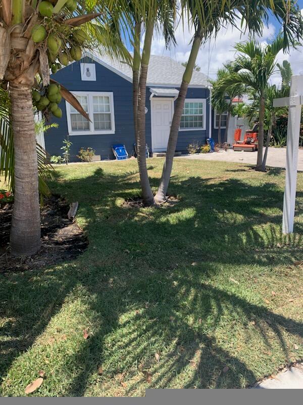 A MUST SEE!! Up and running Air B N B with earning average of 60K$ a year, makes this Mid Century property a diamond in the rough! Here sits a main house and separate cottage, one of Lake Worth Beach's Historically ''designated'' properties, amicably dubbed ANDERSON HOUSE, A charming 2 bedroom 1 full bath and SEASHELLS a 1 bedroom 1 bath cottage both beautifully situated in proximity, within walking distance, under 2 miles to our gorgeous sandy beaches, the iconic Bennys on the Beach - our oceanfront Board Walk, parks, amphitheater, 1/2 mile to the Municipal 18 hole championship golf course, easy access boat dock, 1926 Playhouse and very fine establishments for suds n culinary delights! This is truly a spot in heaven but thats not all! This is Multi-family/commercial zoning making it