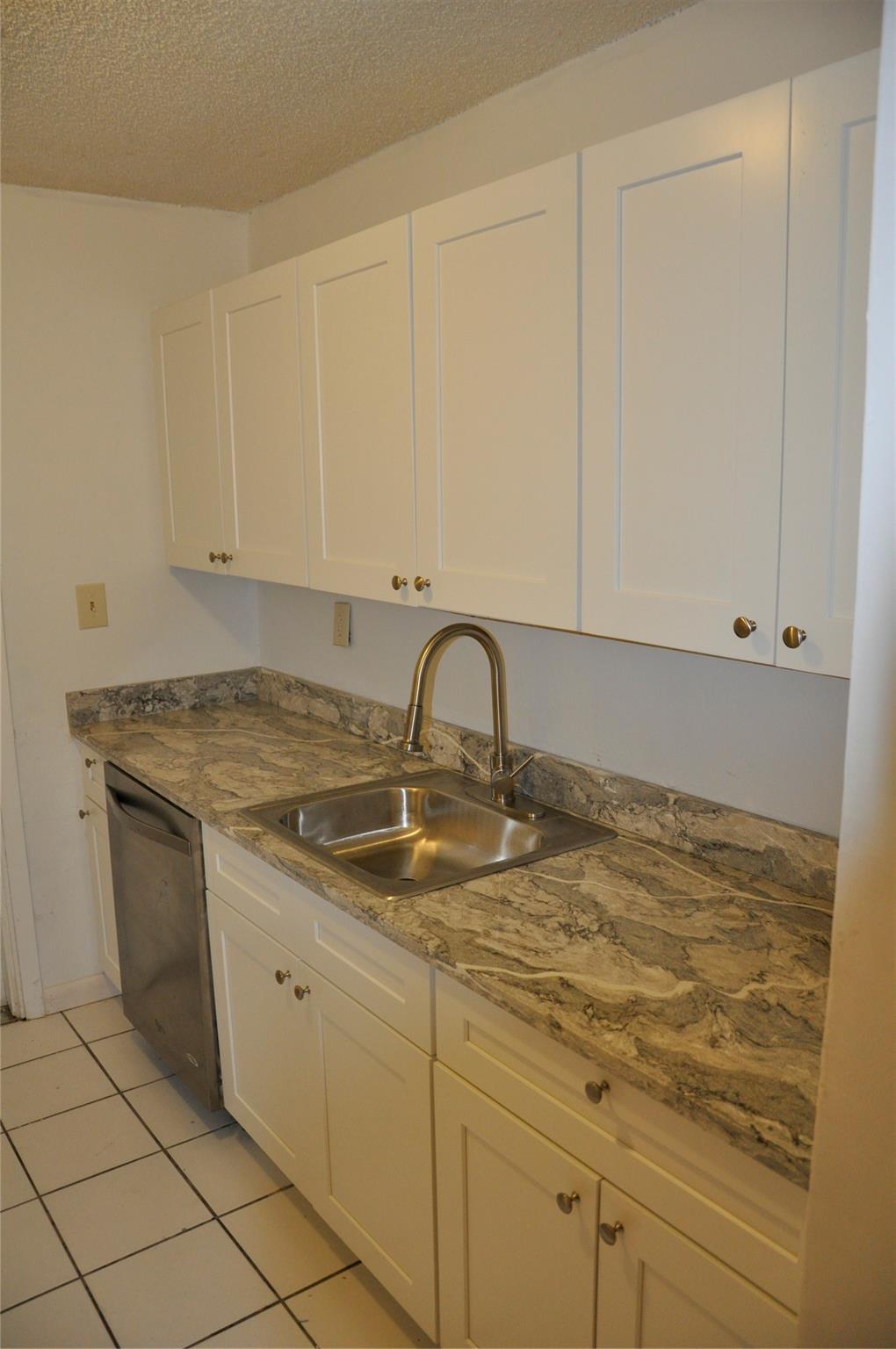 Duplex apartment. Spacious 2bed - 2bath. Recent upgrades include a new kitchen countertops and cabinets, freshly painted. Tile floors, Central A/C. Water, sewer, trash and lawn maintenance are included in rent! Laundry/storage room with Washer and Dryer. Great location! Enjoy the convenience of being close to downtown Pompano's dining and shops. Easy access to the beach and mayor highways. Walking distance to golf course and tennis courts. Unit is vacant and ready for new tenant.