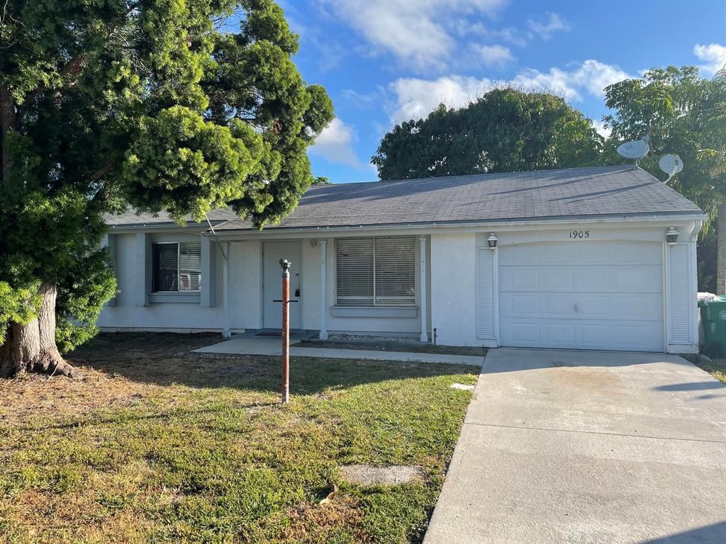 Photo of 1905 SE Redwing Circle, Port Saint Lucie, FL 34952 (MLS # R10707178)