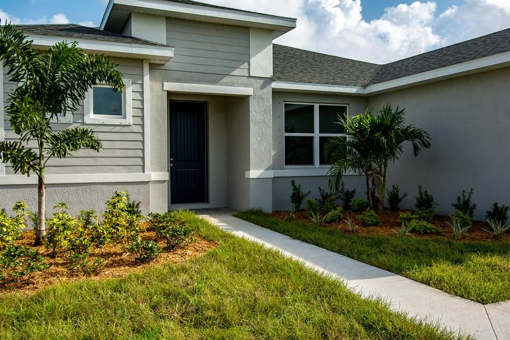Photo of 1049 SW London Lane, Port Saint Lucie, FL 34953 (MLS # R10748547)