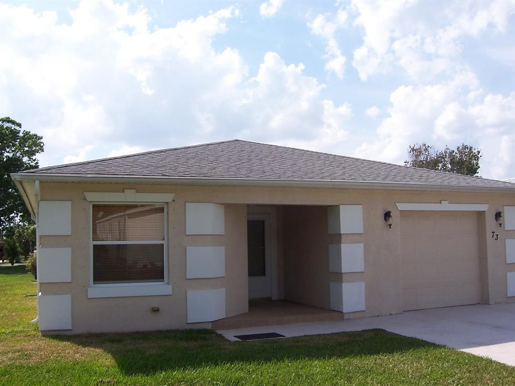Photo of 73 Golf Drive, Port Saint Lucie, FL 34952 (MLS # R10701964)