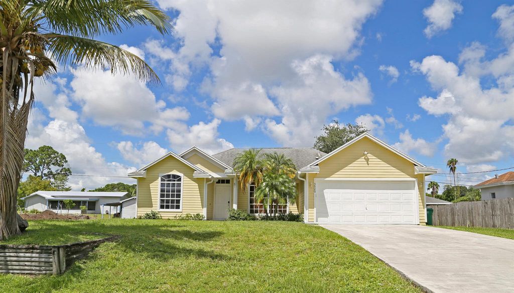Photo of 3020 SW Lucerne Street, Port Saint Lucie, FL 34953 (MLS # R11078215)