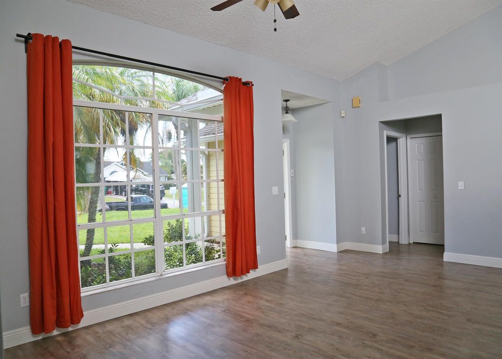 Photo of 3020 SW Lucerne Street, Port Saint Lucie, FL 34953 (MLS # R11078215)