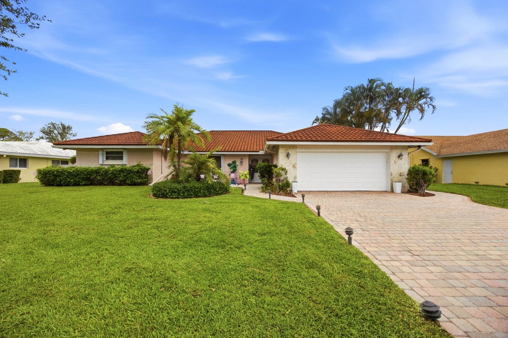 Photo of 375 NW 53rd Street, Boca Raton, FL 33487 (MLS # B26034097)