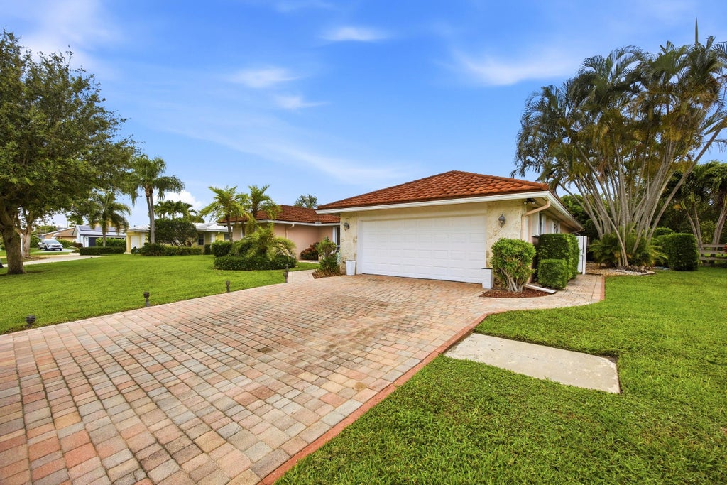 Photo of 375 NW 53rd Street, Boca Raton, FL 33487 (MLS # B26034097)