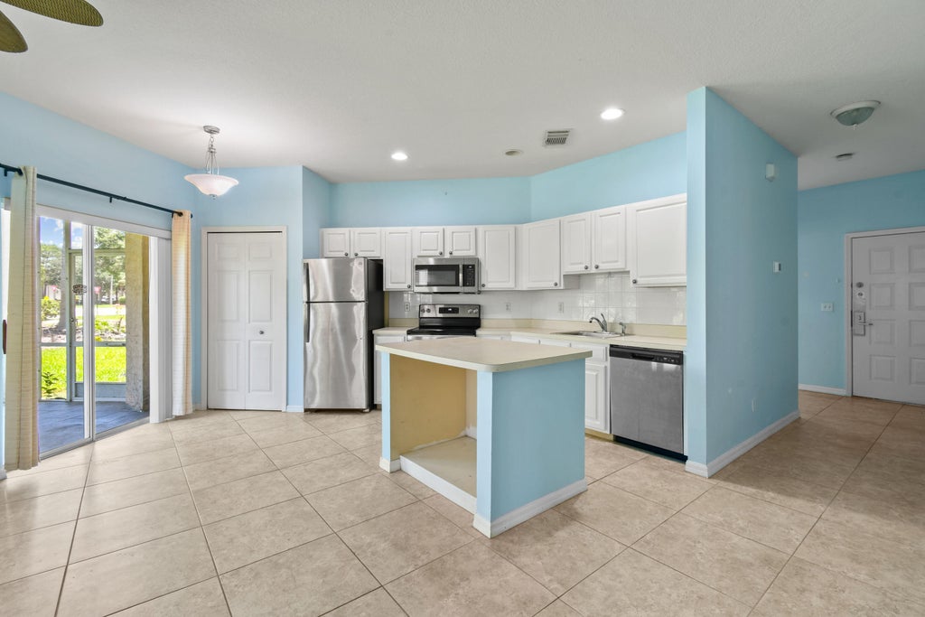 Photo of 10041 Perfect Drive, Port Saint Lucie, FL 34986 (MLS # R11001699)