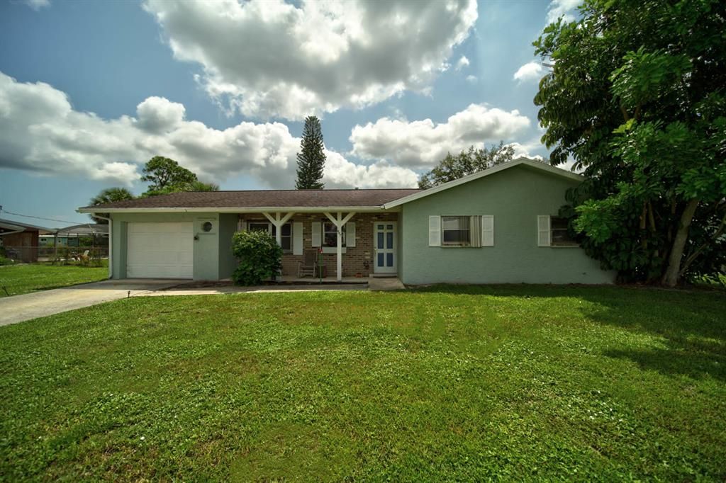 Photo of 607 SE Forgal Street St, Port St Lucie, FL 34983 (MLS # R10733752)