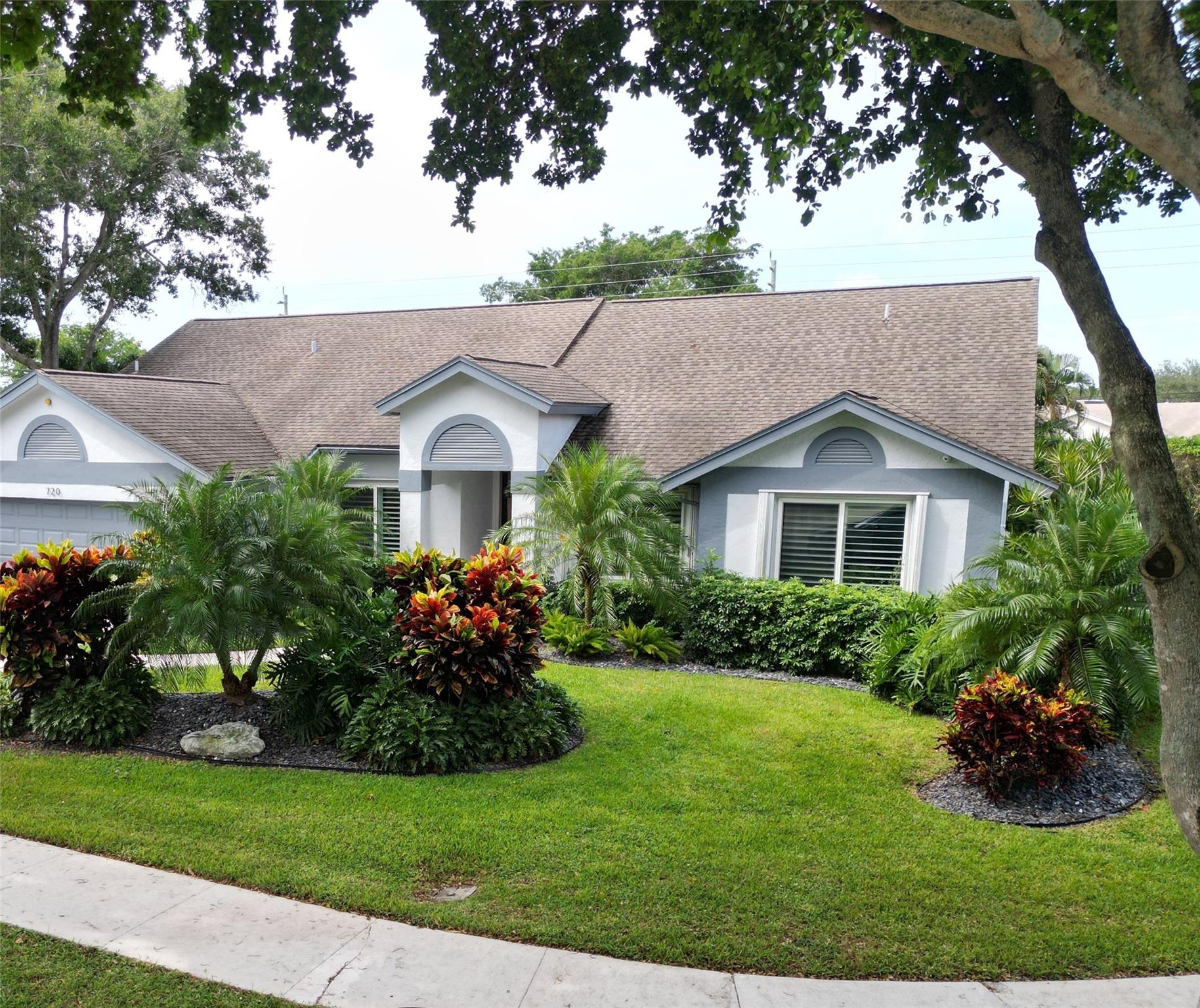 A gorgeous 3 bedroom, 2 1/2 bathroom home in a quaint community of Fairways of Delray. Conveniently located minutes away from the beach, the infamous Atlantic Avenue with its restaurants and entertainment, major stores like Walmart, Publix, TJ Maxx, Costco and others. State of the art kitchen is equipped with Kitchen Aid appliances and soft closing cabinets. Enjoy your breakfast in the kitchen nook with gorgeous views of your Zen Garden. Fully tiled bathrooms are easy to keep neat. Additional room can be used as office or guest room. Plenty of light throughout the house with plantation shutters on all the windows. Master bathroom has both the shower and a hot tub, along with double sink for convenience. Glassed in Florida room leads to a Zen backyard with a relaxing fountain.