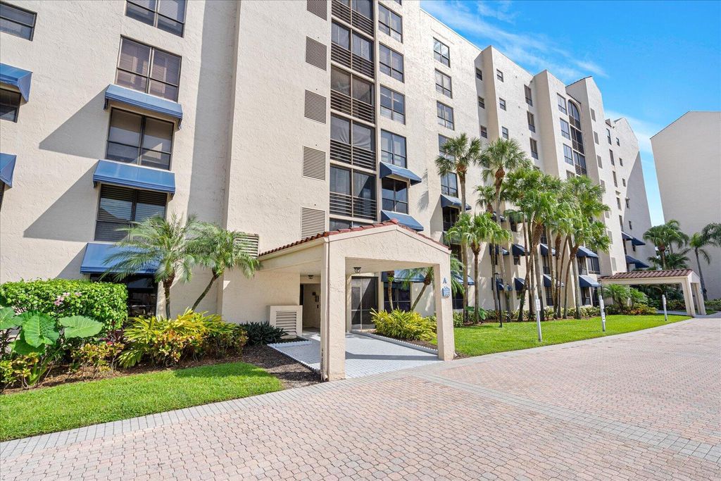 Photo of 7564 Regency Lake Drive #502, Boca Raton, FL 33433 (MLS # B26010695)