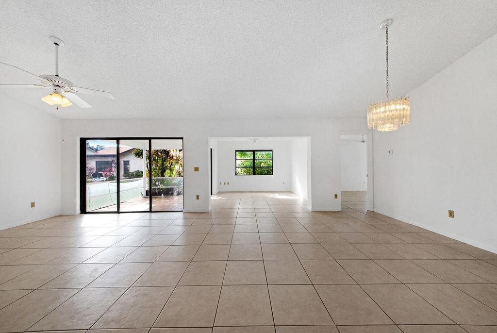 Photo of 6306 White Sabal Palm Lane, Greenacres, FL 33463 (MLS # R10995891)