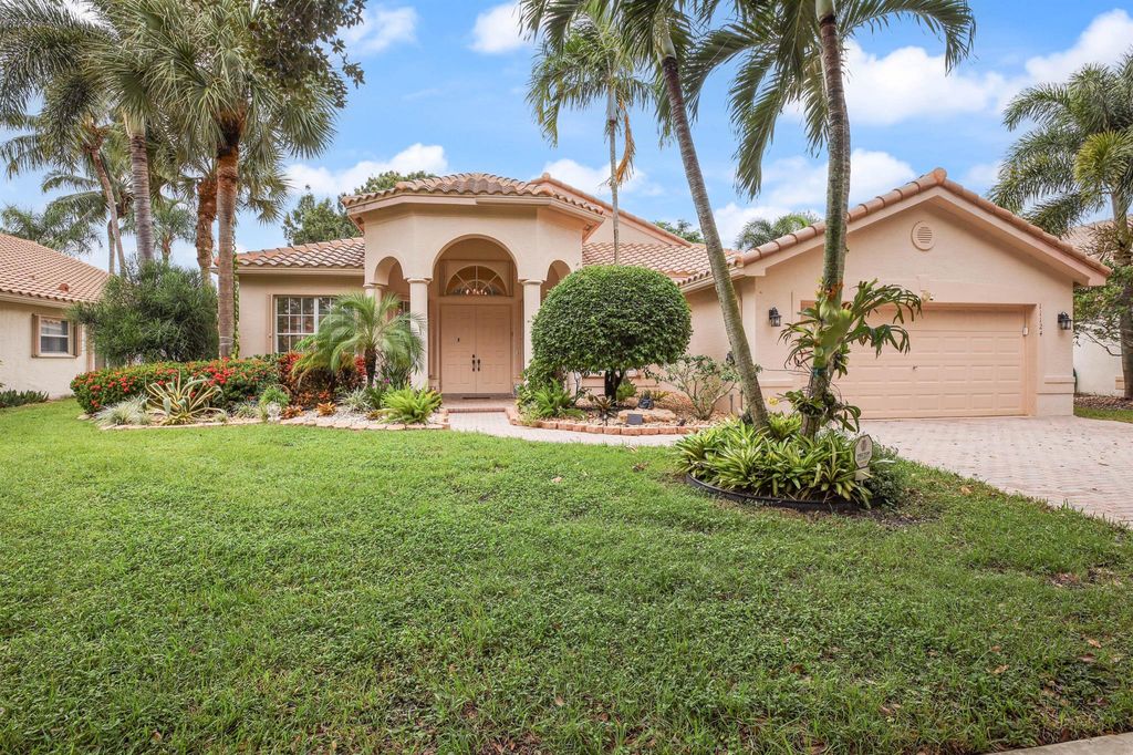 Photo of 11124 Malaysia Circle, Boynton Beach, FL 33437 (MLS # R11131691)