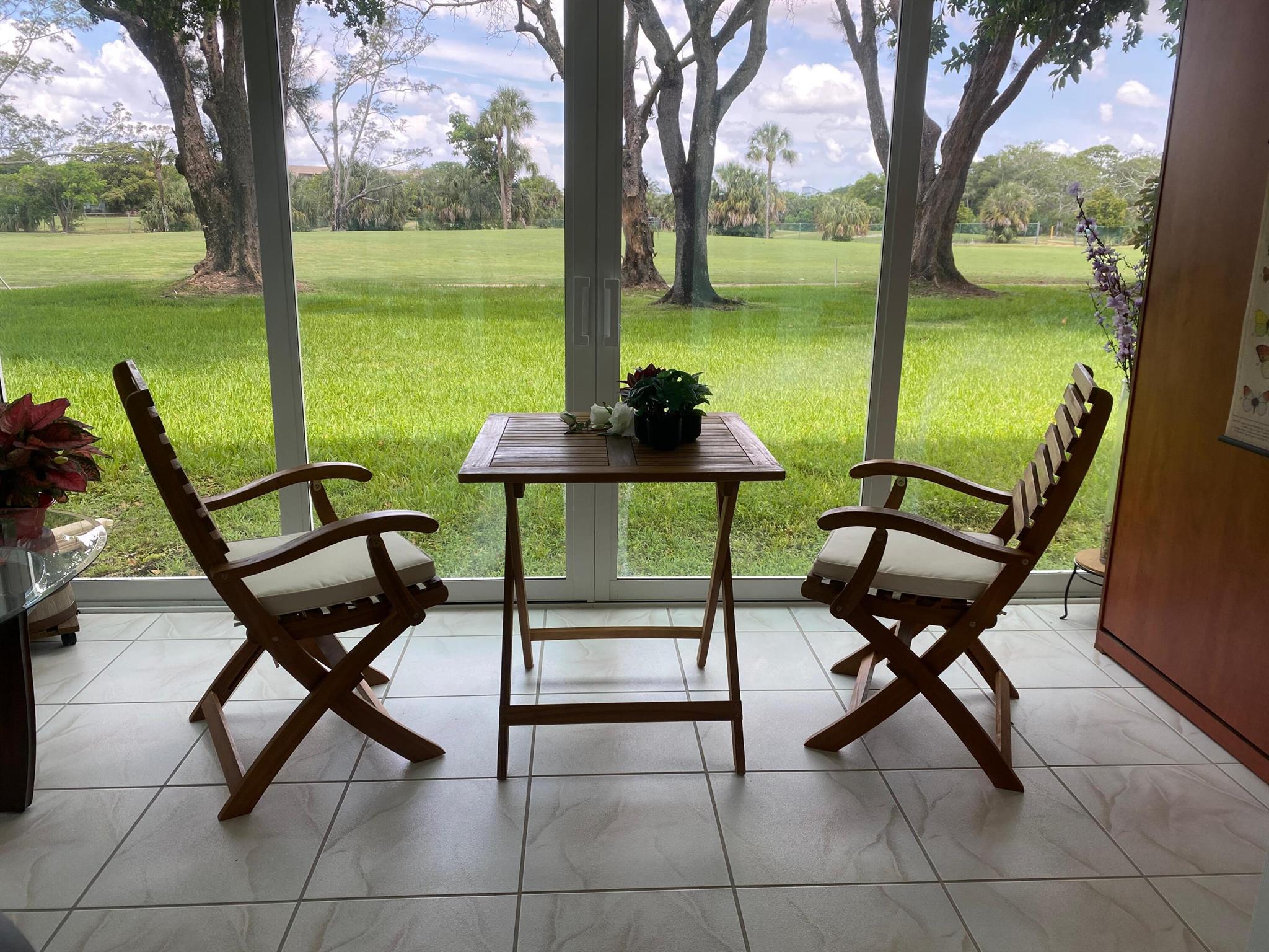 Beautiful 1st Floor 55+ Unit at updated at Oriole Golf & Tennis Club!Spacious kitchen with view into main living area, including wine cooler and so much more! Tile flooring throughout. Enclosed patio w/murphy bed for occasional guests staying over with a stunning Golf View. Fantastic Unit for a full-time resident or snowbirds.Note: Leasing allowed after 2 years of ownership.