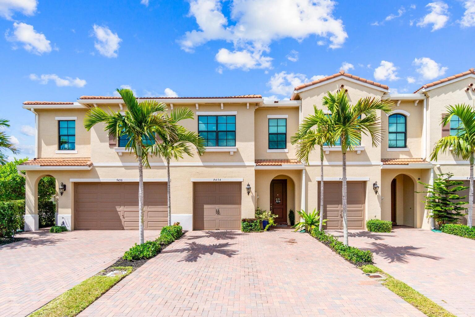 **** SELLER MOTIVED ****This exceptional townhome in the highly sought-after luxury community of Boca Dunes offers an incredible living experience. Boasting three spacious bedrooms, two and a half baths, and over 2,000 square feet of living space, this home is designed with both style and functionality in mind. The private patio offers serene lake views, ideal for enjoying tranquil sunsets or entertaining guests. The property is equipped with impact windows and doors, enhancing energy efficiency. As a resident of Boca Dunes, you'll have access to resort-style amenities, including a gorgeous clubhouse, a massive pool, a spa, fitness center, and a tot lot. For golf enthusiasts, the Boca Dunes Golf Course is just next door, where you can pay to play for the day or the day or even become a me